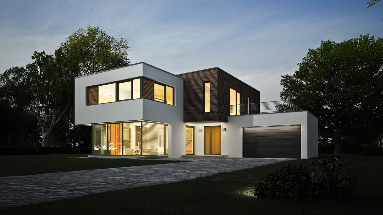 Saniertes Wohnhaus in der Dämmerung mit warm beleuchteten Fenstern von Herr Fensterbau